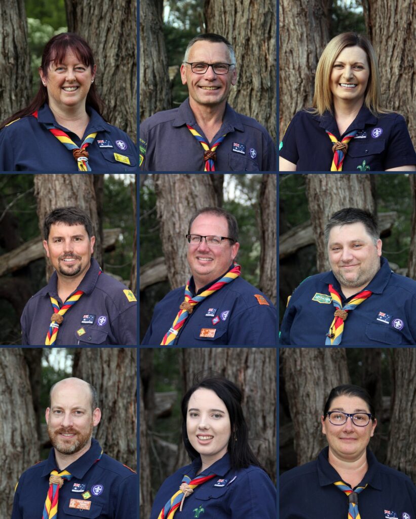 Nine Heany Park leaders in uniform and scarves